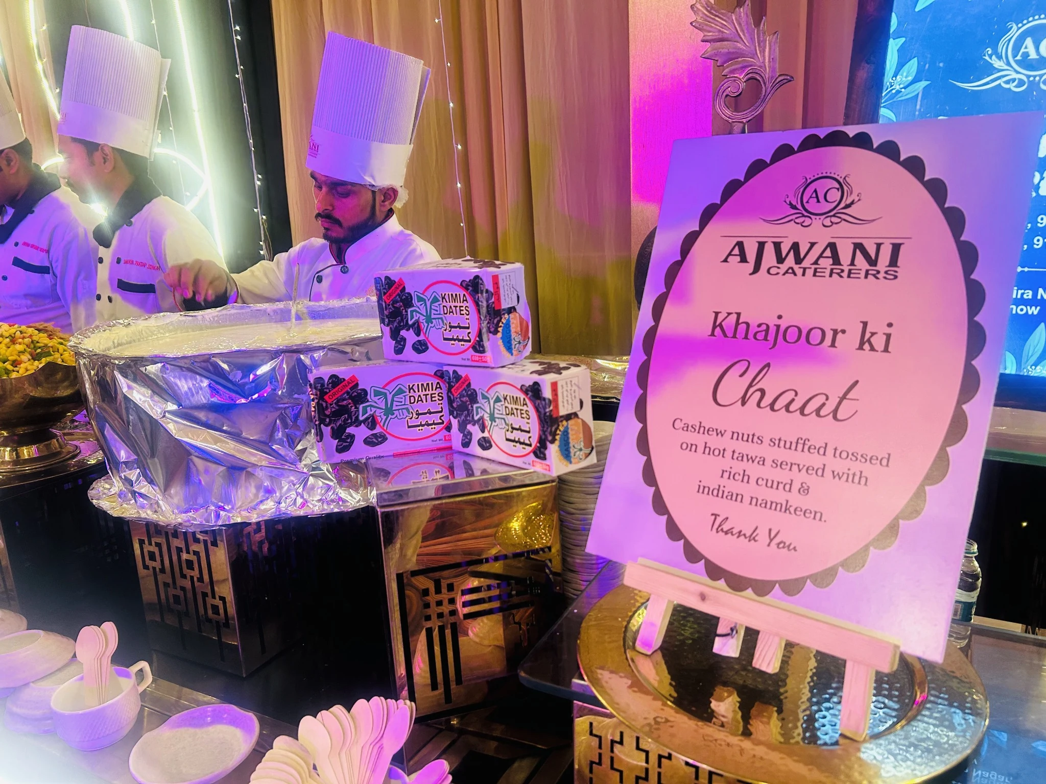 Ajwani Caterers chefs preparing Khajoor Ki Chaat at a live event counter