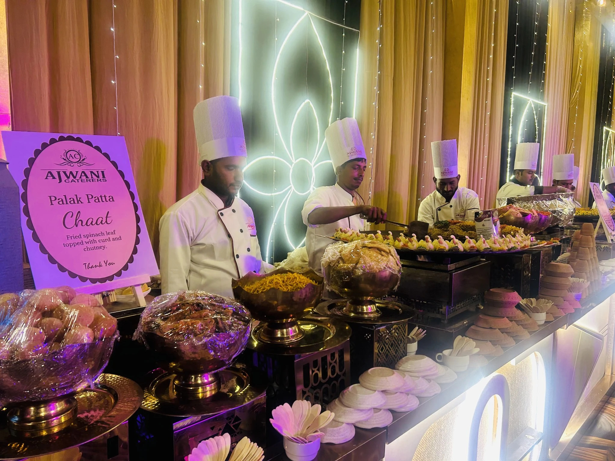 Ajwani Caterers live catering counter with chefs — hero slide 2